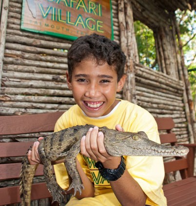 Jamaica Swamp Safari - boy and crocodile Jamaica Swamp Safari Tour in Montego Bay
