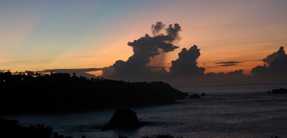 The sun rises over the Pacific Ocean in Huatluco, Mexico