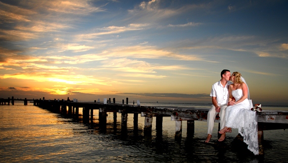 Newlyweds at sunset for a flawless wedding