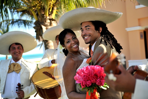 Newlyweds enjoying a serenade in their flawless wedding