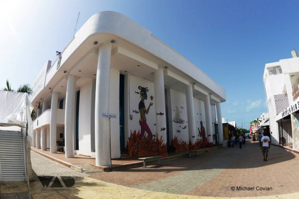 Mexican muralist Saner's mural of the goddess Ixchel on Isla Mujeres island.