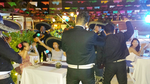 Mariachias playing for the guests at Secrets The Vine's <br>2nd year anniversary celebration