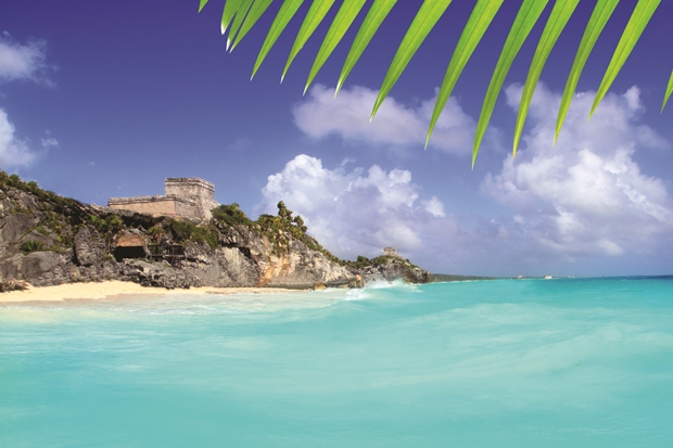 The ruins at Tulum as seen from a boat off the coast of the Riviera Maya