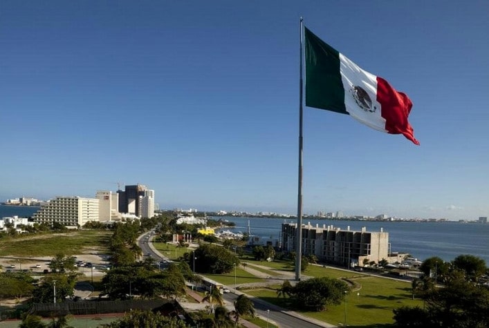 The Mexican flag flying over Cancun's Hotel Zone