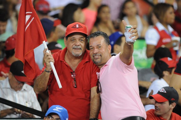 Local supporters at a baseball league game in the Dominican Republic