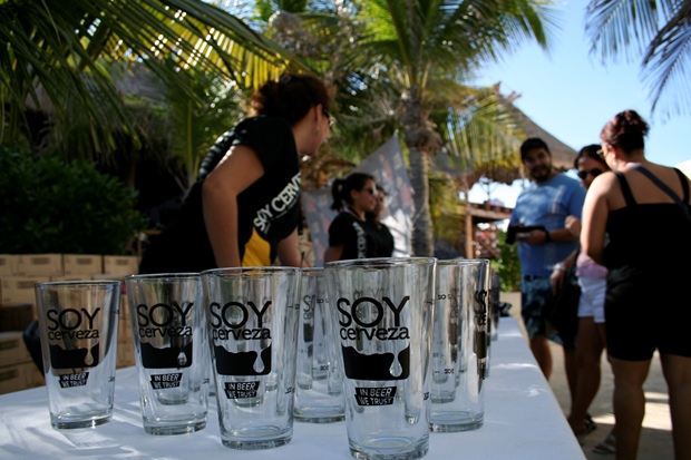 Participants to the International Beer Fest Soy Cerveza receive a free beer glass