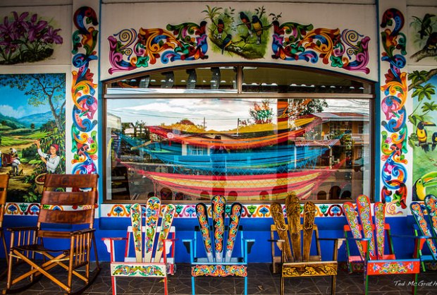 A pura vida store with colorful chairs in Costa Rica