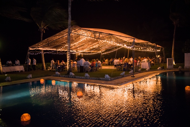 An off-site wedding rehearsal dinner at the beach in the Riviera Maya