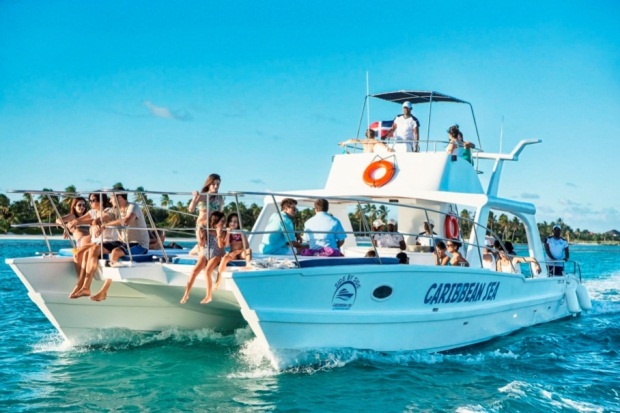 A catamaran sails off the coast of Punta Cana