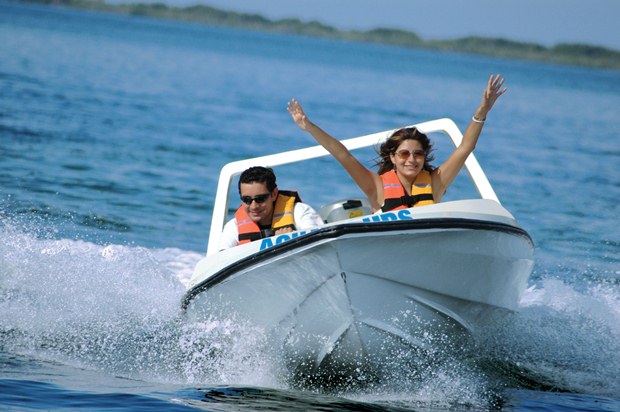 A couple sets off through the mangrove channels of Cancun on the Amstar dmc Jungle Tour