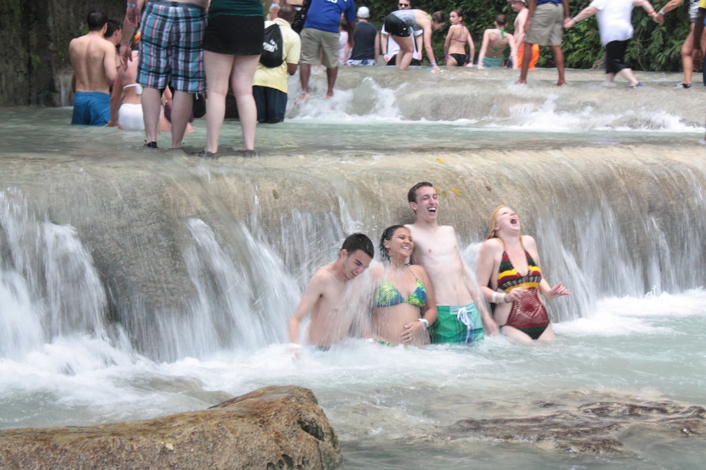 One destination family vacations is Dunn's River Falls in Jamaica