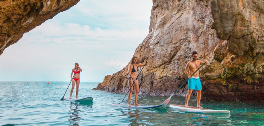 Tourists floating on surfboards in Marietas Islands, Mexico