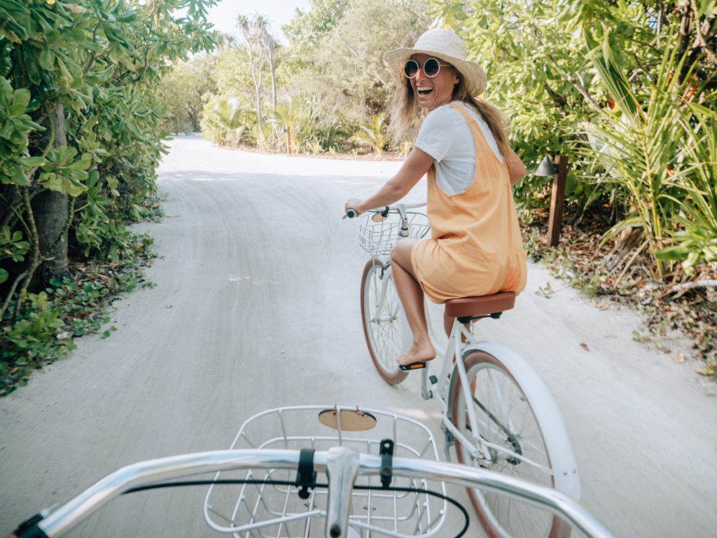 Pov point of view of couple cycling in Punta Cana