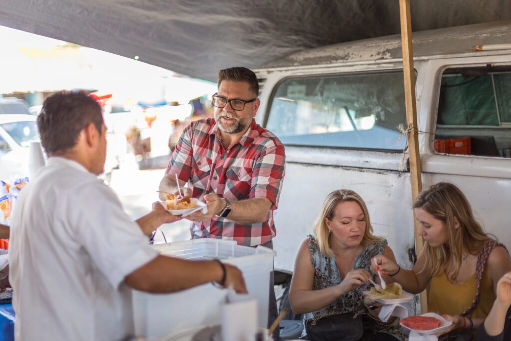 Man buying tamales