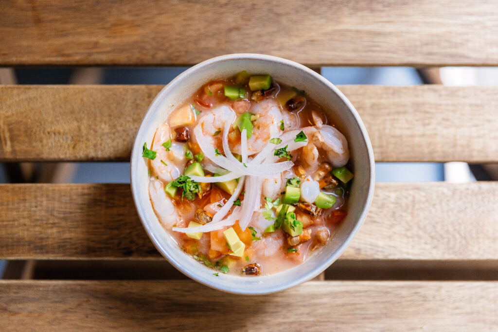 Shrimp ceviche in a bowl, directly above view