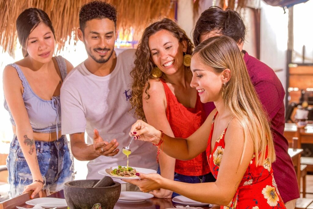 Friends enjoying tacos in Playa del Carmen