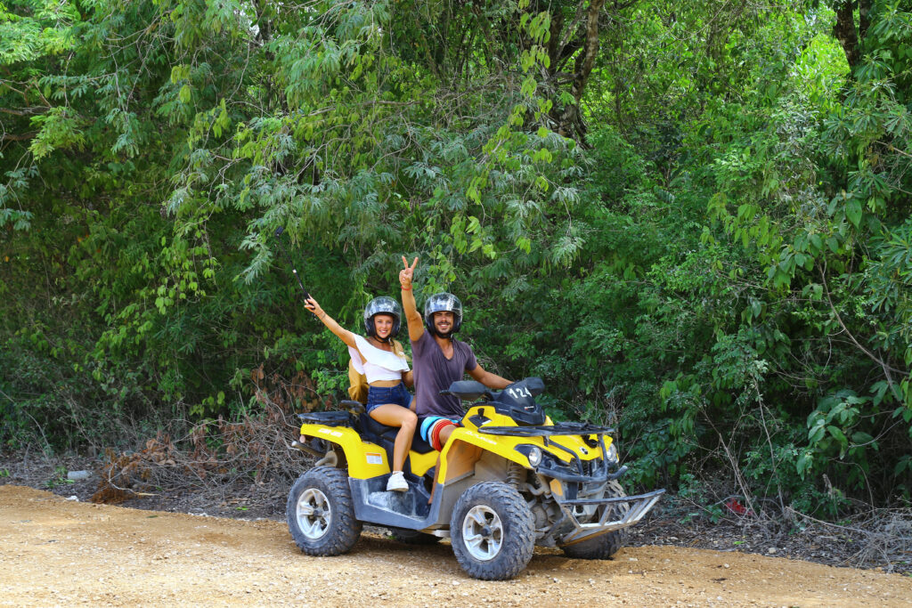 Couple on an ATV Cancun experience