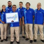 Amstar representatives at the airport