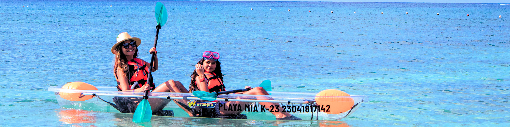 Mom and daughter on Playa Mia