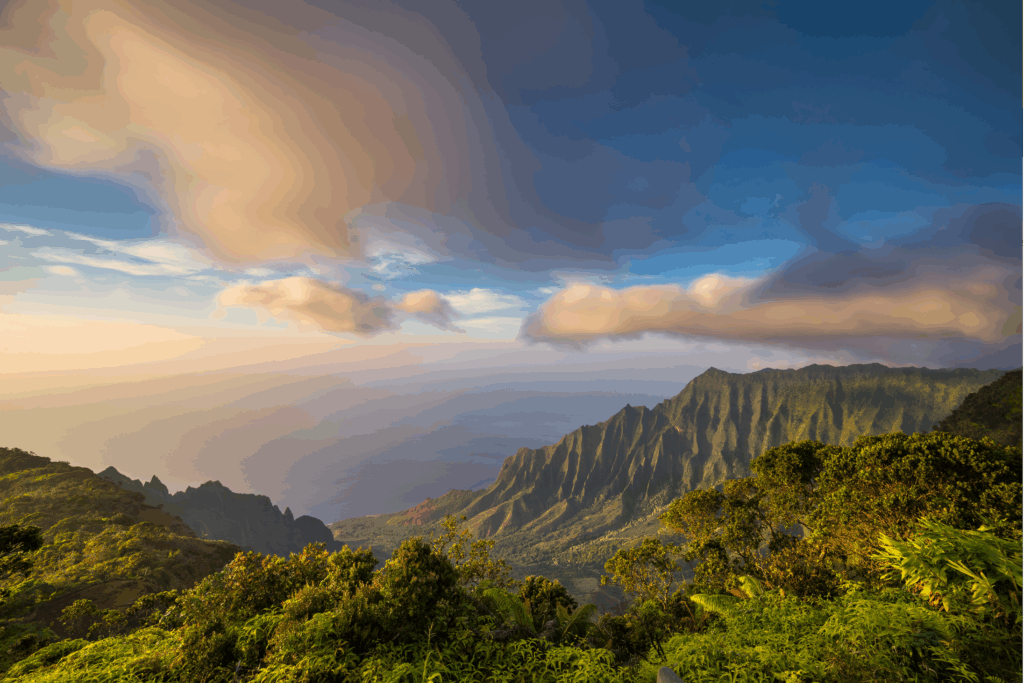 A wide view of a mountainous valley in Hawaii.