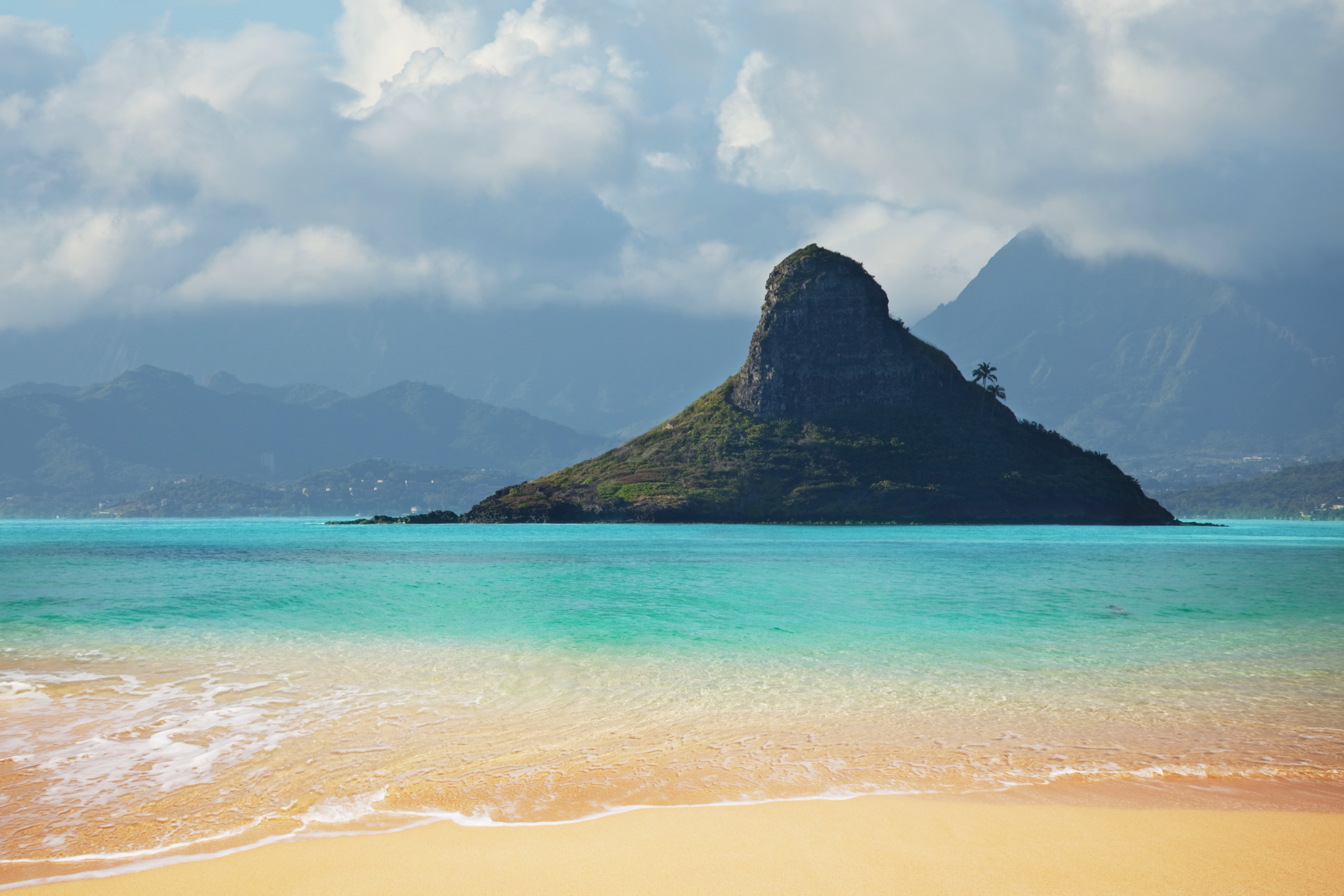 Mokoliʻi island with a light sand beach in Oʻahu, Hawaii.