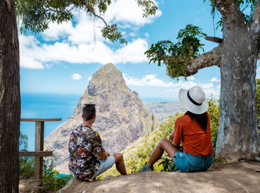 A couple looking at the Pitons in St. Lucia