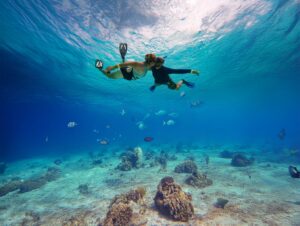 Couple snorkeling romantically