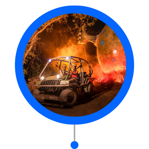 Couple driving a buggy in the Mexican Caribbean