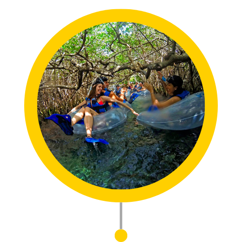 Young couple enjoying the river at Xel-Há