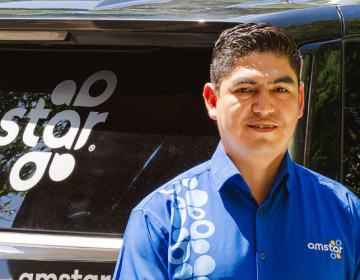 Amstar Driver waiting for visitors to start their experience.